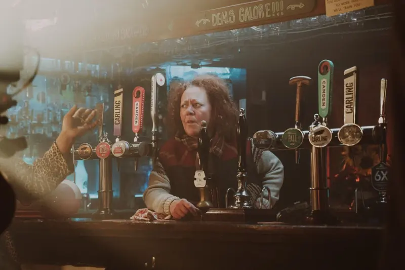 Never Never Never: a red-haired barmaid behind the beer taps of a village pub