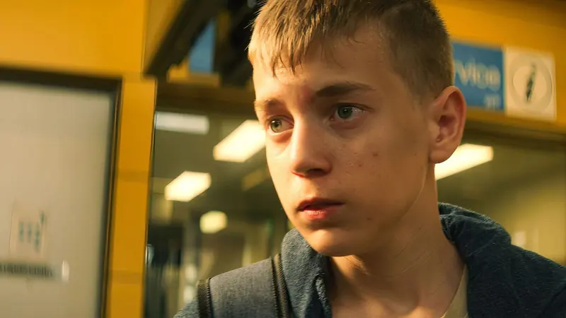 Tarneit: a teenage boy in a grey hoodie at a train station
